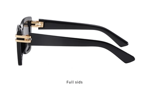 Detail of square black sunglasses showing wide temples and gold metal accents
