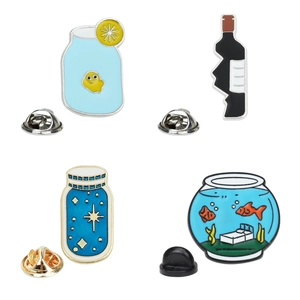 Set of four cute cartoon enamel pins featuring goldfish bowl and wine bottle designs