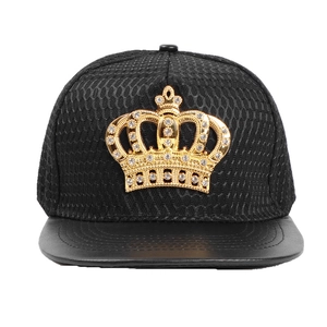 Hip hop snapback hat featuring a gold crown emblem with rhinestones on black mesh fabric