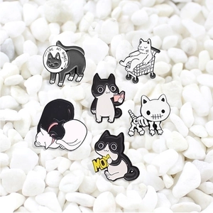 Set of six cute cartoon cat enamel brooches in black and white with diverse poses