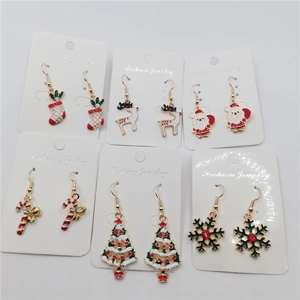 6-pair set of Christmas earrings featuring Santa, reindeer, and snowflakes on hooks