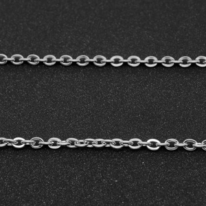 Silver stainless steel cross chain link necklace for men and women on dark background