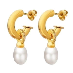 Golden C-shaped hoop earrings with Baroque pearls and sparkling crystals in white background