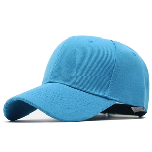 Detail of light blue cotton baseball cap showing curved brim and 6-panel stitching