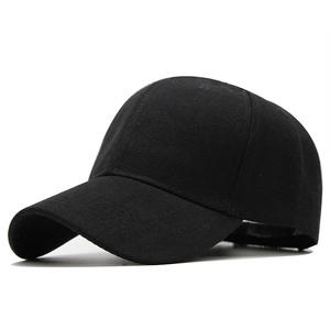 Detail of classic black cotton twill baseball cap with six-panel design and curved brim