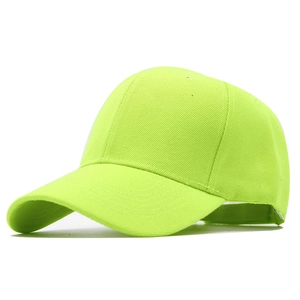 Detailed side view of a neon green six-panel baseball cap with a curved visor on white background