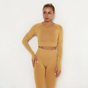 Detail of ginger seamless yoga set with thumbhole cuffs and high-waist fitness leggings