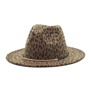 Close-up of leopard print wool fedora with a decorative gold metal ring detail