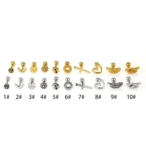 Collection of 20 stainless steel stud earrings in skull, floral, and moon designs