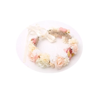 Handmade silk flower headband with pink and cream blossoms and adjustable ribbons