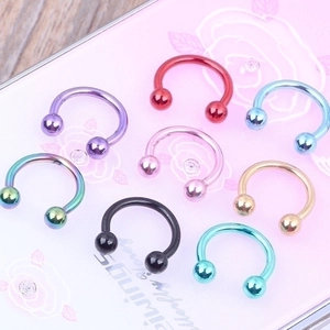Classic C-shaped body piercing rings in 8 colors made of polished stainless steel