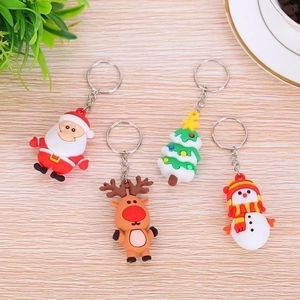 Set of Christmas silicone keychains with Santa Claus, Reindeer, Snowman and Xmas tree charms