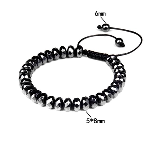 Detail view of 5x8mm faceted hematite beads and 6mm round beads on adjustable cord