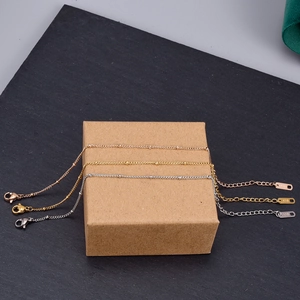 Minimalist 18K gold bean bead bracelets in rose gold, yellow gold, and silver finishes