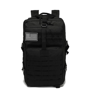 Waterproof tactical backpack in black nylon with MOLLE system and USA flag patch