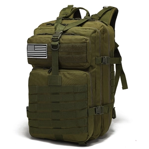 Macro shot of durable nylon tactical backpack featuring MOLLE webbing and American flag patch