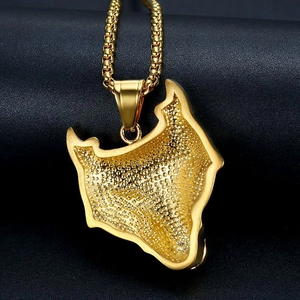 Golden Viking Celtic wolf head pendant necklace with rhinestones on a textured background