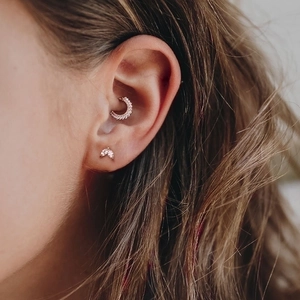 S925 sterling silver marquise crystal stud earrings and hoop shown on a model ear