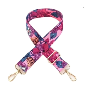 Adjustable floral pink fabric bag strap with light gold metal lobster clasps and buckles