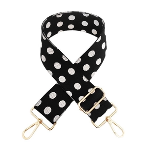 Adjustable wide replacement shoulder strap with black and white polka dots and gold hardware