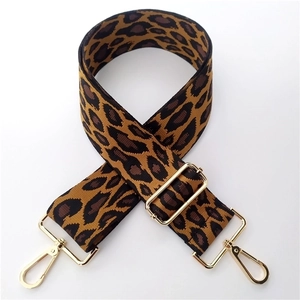 Adjustable leopard print bag strap with golden metal hooks for crossbody bags