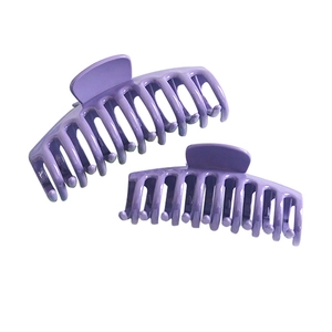 Set of two purple candy-colored hair claws in different sizes for women hair styling