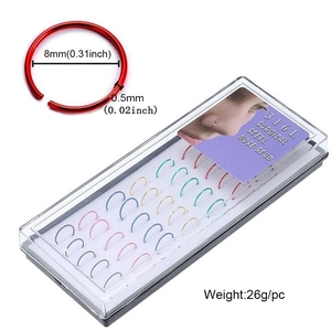 Detailed view of 8mm 316L surgical steel C-shaped nose rings set with size specifications