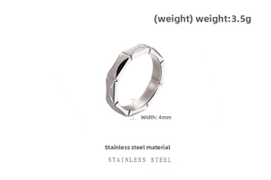 Detail view of 4mm brushed stainless steel ring with geometric faceted design