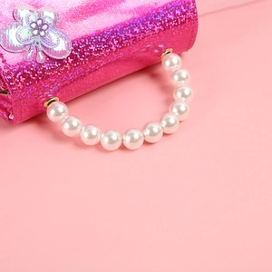 Pink glitter girls purse with elegant pearl handle and sequin floral decoration
