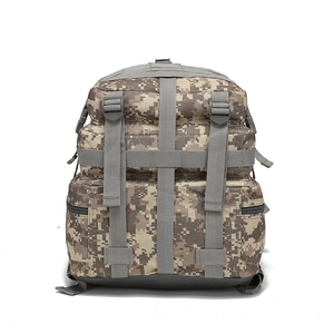 Detailed view of digital camouflage tactical backpack with durable Molle webbing system