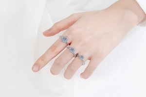 Detailed comparison of three S925 silver moissanite rings with different carat sizes
