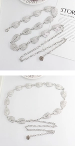 Silver metal leaf chain belt featuring rose pendant detail and adjustable link closure