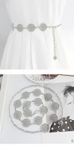 Detail of silver hollowed metal chain belt with rose pendant and lifestyle display