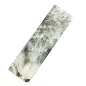 Gray-green tie-dye yoga headband for women made of elastic knit fabric on white background