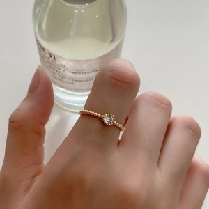Gold beaded 925 sterling silver ring with a sparkling zircon diamond for women