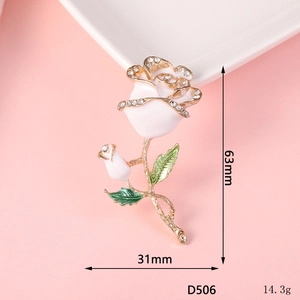 White enamel rose brooch with gold edges and rhinestones, size 63mm by 31mm, model D506