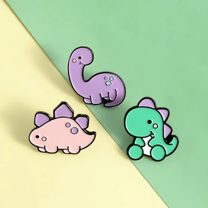 Lot de trois pin's émaillés dinosaures mignons avec stégosaure cartoon aux couleurs pastel