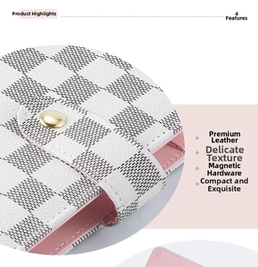 Detail showing the white checkered leather texture and golden magnetic closure