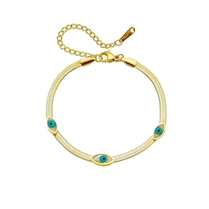 Gold stainless steel flat snake chain bracelet featuring three blue evil eye charms