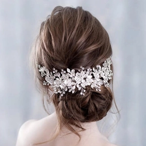 Detailed back view of a silver floral vine bridal headband with sparkling rhinestones