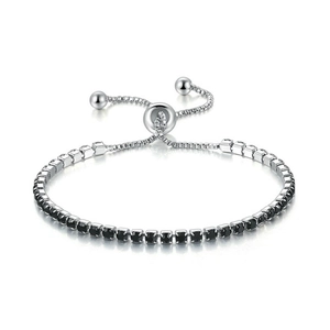 Macro shot of adjustable sliding clasp on tennis bracelet with black square-cut zircons