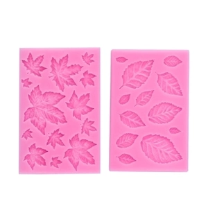 Pink silicone leaf molds set featuring detailed maple and foliage textures for cake decor
