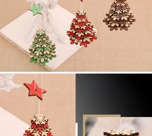 Detail of layered wooden Christmas tree ornaments with star pendant and festive rope