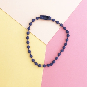Detail view of dark blue matte ball chain accessory for DIY keychains and jewelry tags