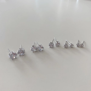 Set of five pairs of 925 sterling silver six-prong cubic zirconia stud earrings in varied sizes