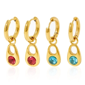 Gold hoop earrings with red and blue teardrop stone pendants on a white background