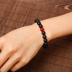 Adjustable couple bracelet with matte black agate beads and one glossy red stone