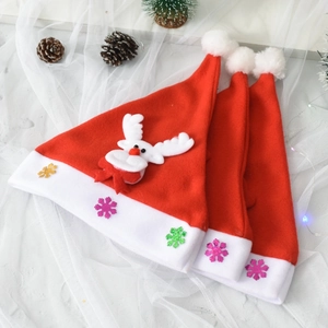 Three red felt Christmas hats with reindeer plush decor and LED lights on white mesh