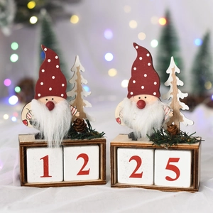 Christmas wooden countdown calendar with Santa Claus pine cones and festive decorations