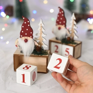 Wooden Christmas gnome countdown calendar with pine tree and red numerical blocks